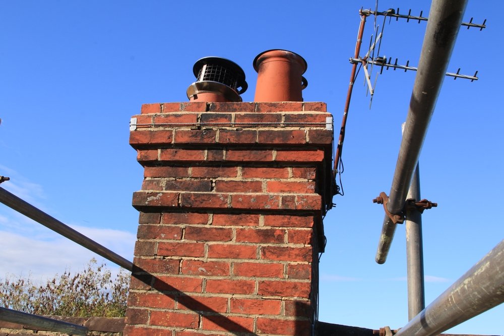 service-3 old,brick,chimney,stack,in,need,of,repointing
